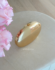 Rhea Metallic Gold Clutch