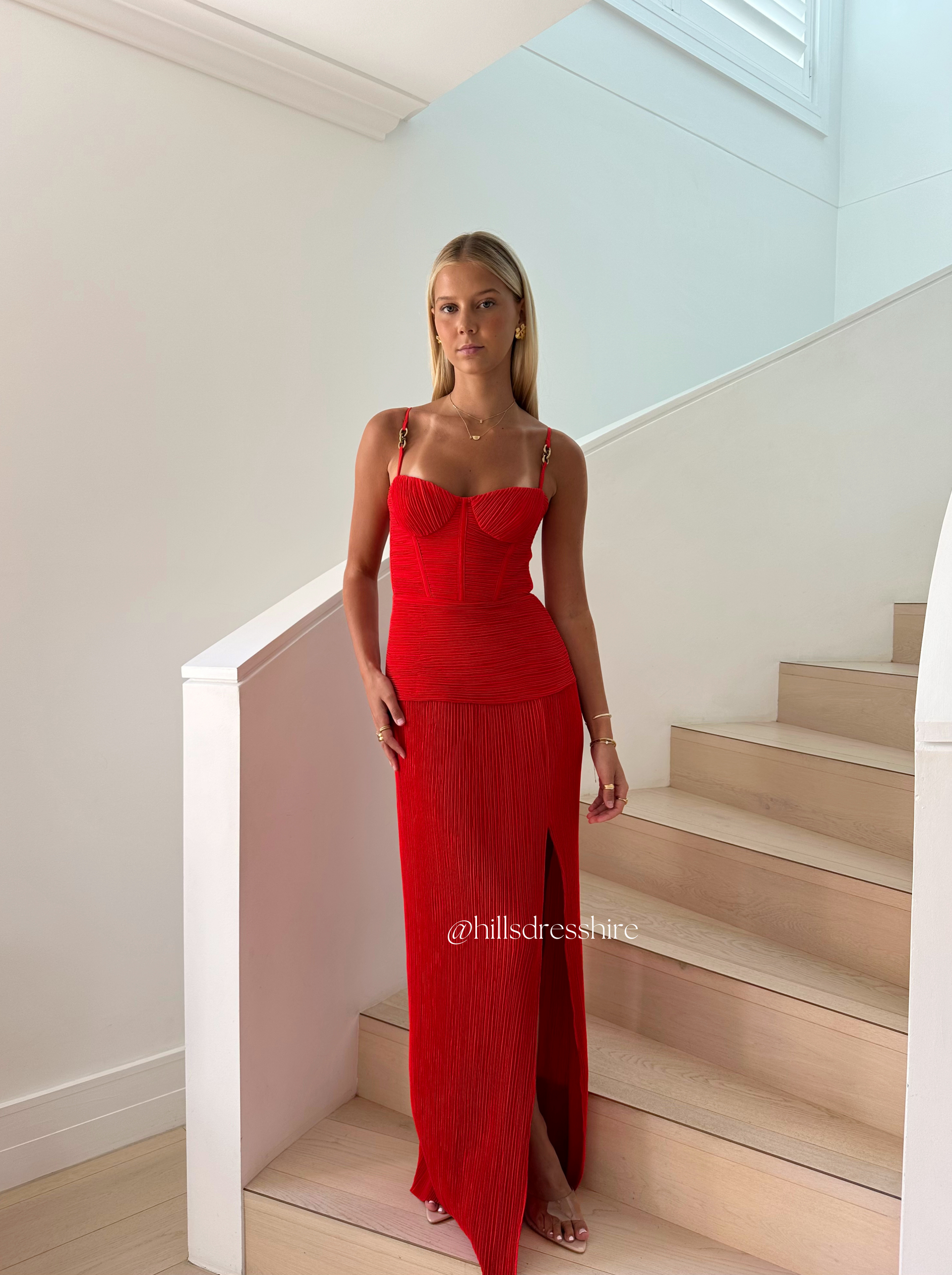double time pleat dress red New colourway! Manning Cartell Double Time Pleat Dress in a gorgeous new RED The dress features elegant pleats throughout and considered boning through the corset top and flows into a beautiful